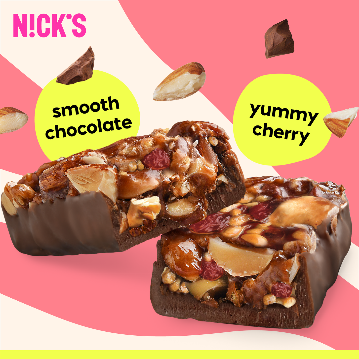 Detailed cross-section of the Cherry Crunch Nut Bar, showing crunchy cashews, roasted almonds, and chewy red cherries layered in a chocolate coating.