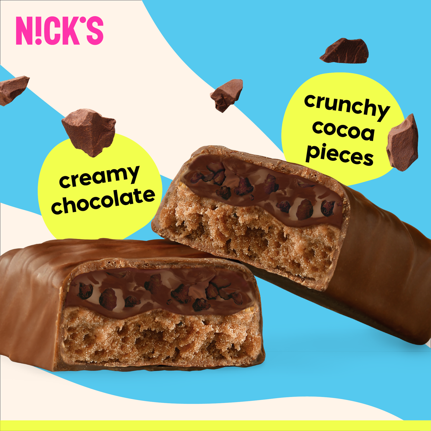 Close-up cross-section of a N!CK'S Triple Chocolate Protein Bar, clearly showing a layer of creamy chocolate and crunchy cocoa pieces over a soft protein base.